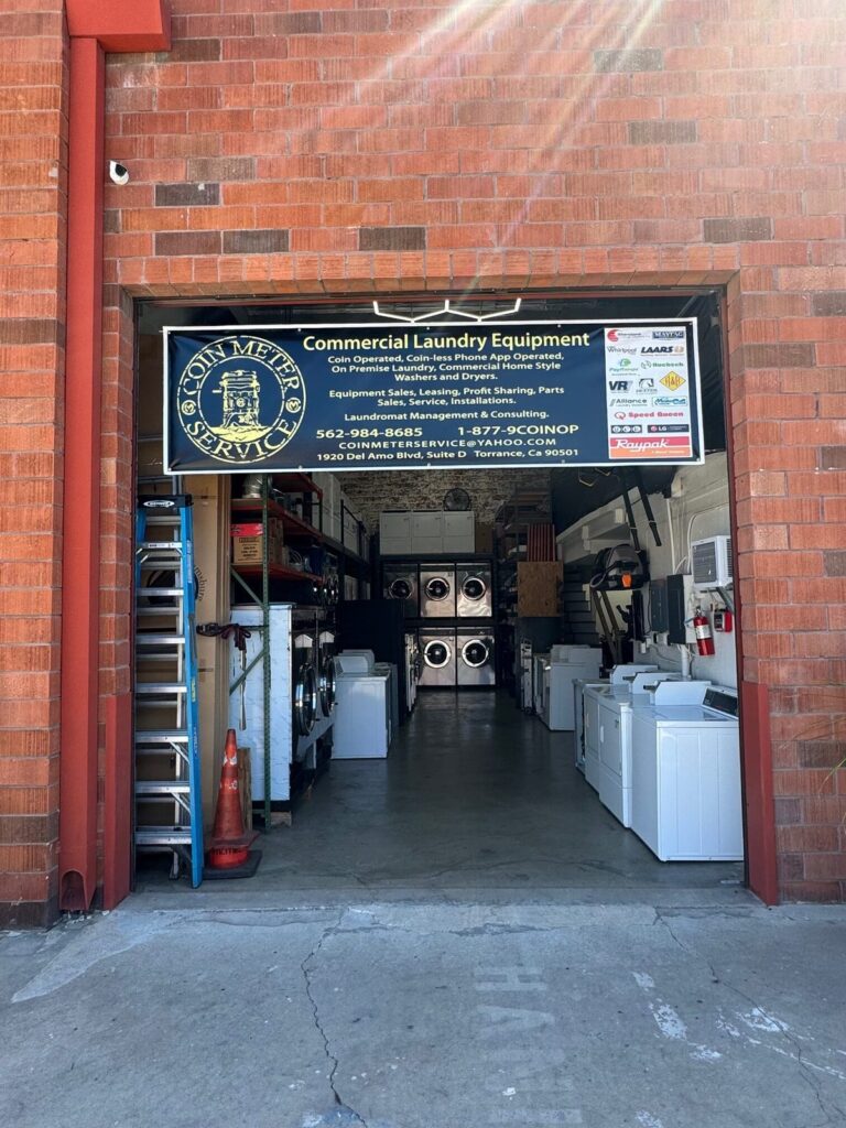 Scheduled preventive maintenance on a row of commercial washers